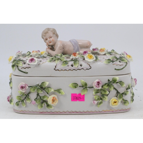 48 - Porcelain floral decorative box with cherub to top lid.