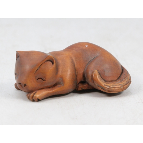 50 - Carved wooden Japanese Netsuke cat, signed to base