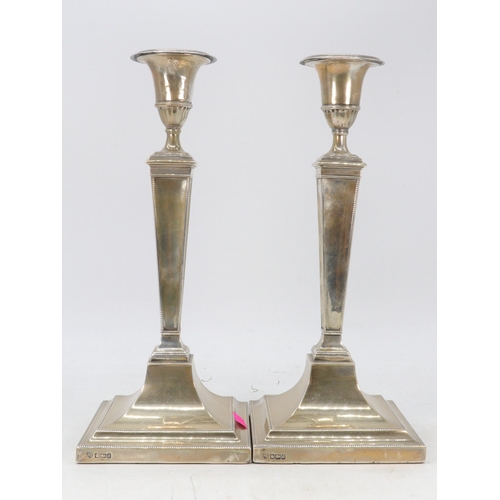 71 - A pair of Edwardian silver hallmarked candlesticks (approx. height 31cm)