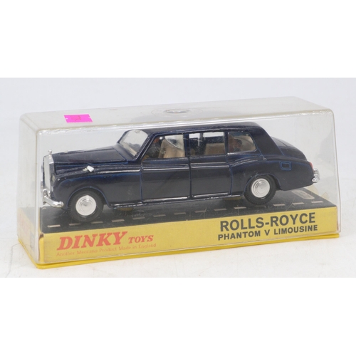 82 - Dinky toys 152 Rolls Royce Phantom V Limousine, on card plinth base with plastic clear cover. Car VG... 