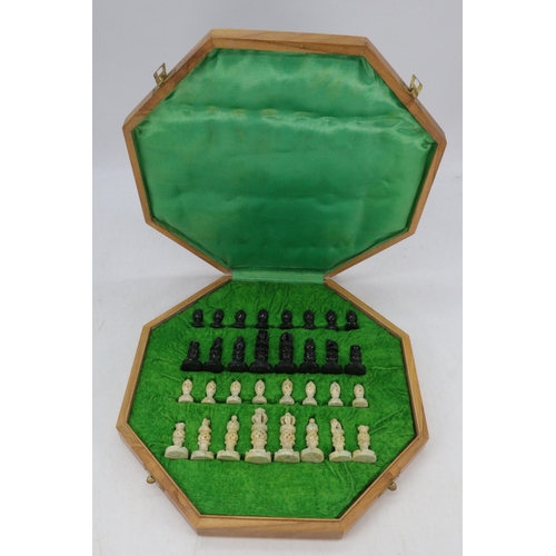 121 - Carved Soapstone chess set in folding chess board case