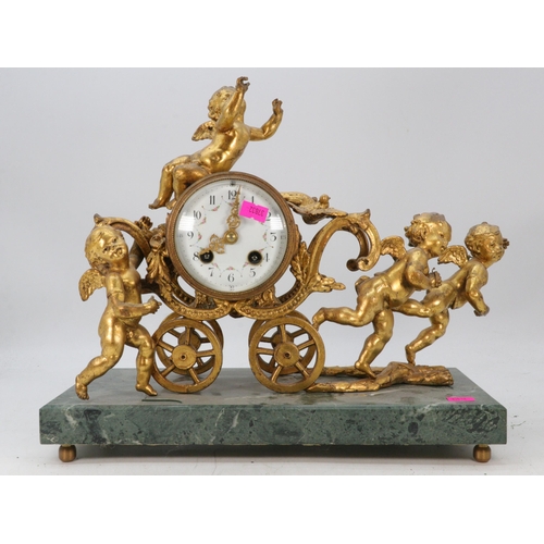 184 - French gilt metal cherub carriage mantle clock.