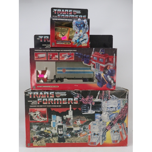 187 - Transformers Autobot G1 Optimus Prime with original box together with Metroplex battle station boxed... 