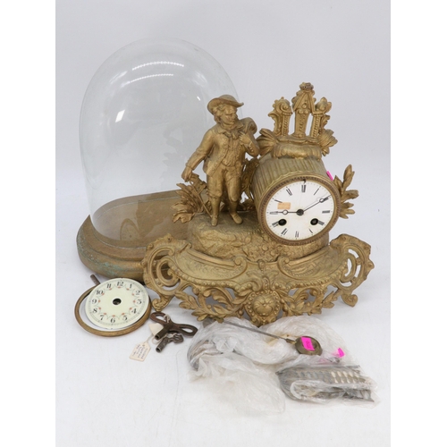 284 - A gilt spelter mantle clock together with glass dome and base (non associated)