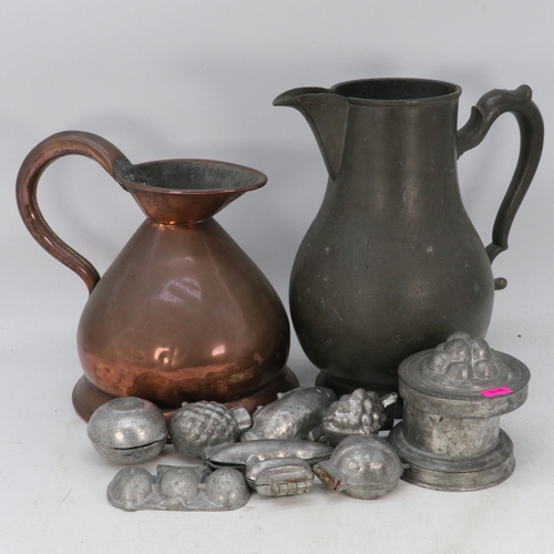 465 - A selection of vintage cast chocolate moulds some by Jones and Son, together with a pewter jug and a... 