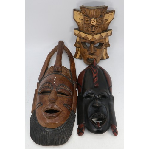 470 - Seven African carved and decorative wall/face masks