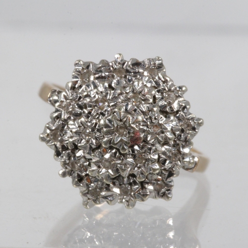 180I - A 9ct gold diamond encrusted ring (approx. 3.5g)