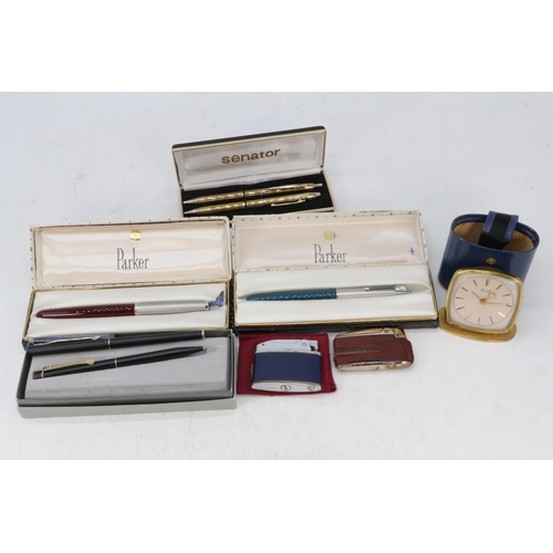 38 - Two boxed Parker pens, Sheaffer pen, Ronson lighters, Travel alarm clock etc