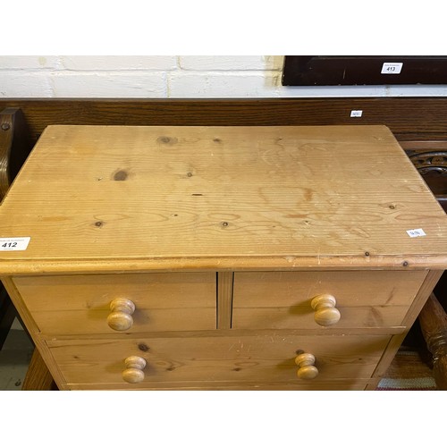 412 - A pine two over two chest of drawers of small proportions (Measures approx. L60cm x W32cm X H60cm) t... 