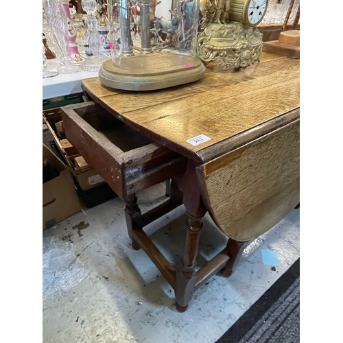 283 - A large antique oak gateleg table (measures approx. L105cm x D47cm x H74cm - closed)