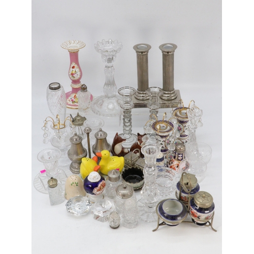 303 - Selection of glass candlesticks, cruet sets etc