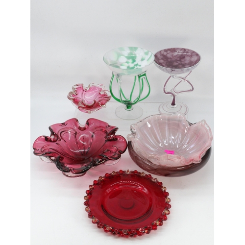 325 - A Murano style cranberry bowl together with a smaller similar and other decorative glassware