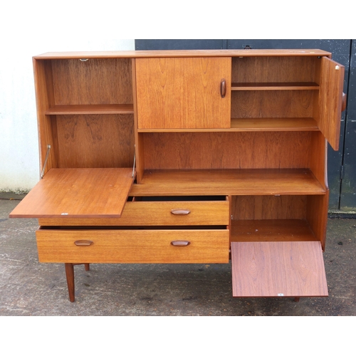 22 - A G-Plan sideboard with cabinet over, measuring approx. 153w x 42d x 138cmh