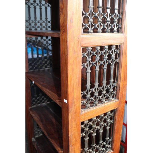 156 - A pair of hardwood bookshelves with oriental style grill sides made by William Sheppee They measure ... 