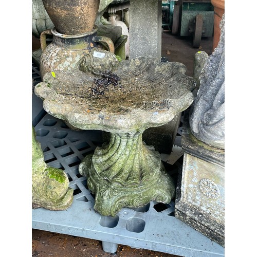 295 - Oyster shell bird bath measures approx. 50cm tall