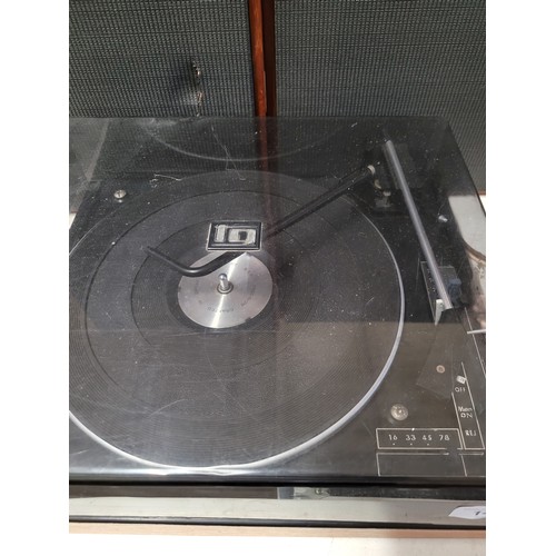 141 - A BSR record deck and speakers. Trade - spares or repairs. Also a grey cased un-branded speaker