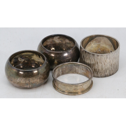 19 - Four silver hallmarked napkin rings. (approx. 100g)