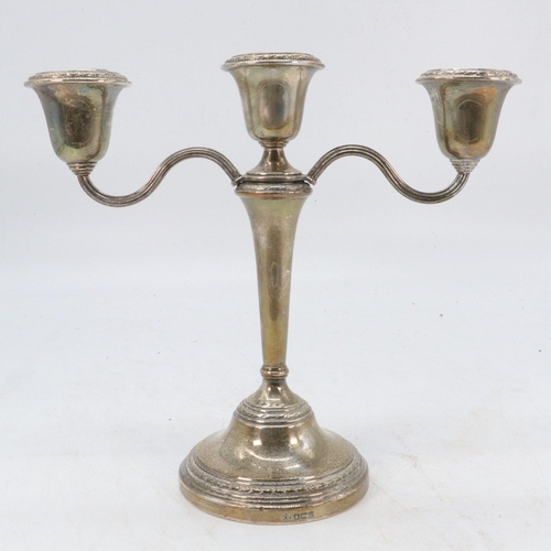 23 - A silver hallmarked weighted Candelabra. (approx. 630g, approx. 21cm tall)