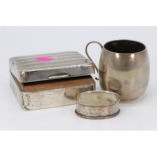 31 - A silver cedar lined cigarette box, silver napkin ring together with a small silver cup. (total appr... 