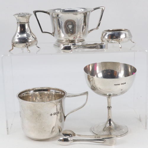 32 - Silver hallmarked small trophy, Christening cup, two handled mug, two sugar tongs, pepper pot and a ... 