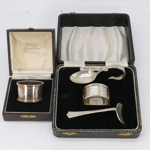 40 - Cased silver christening set together with a similar cased napkin ring (approx. weight 80g)