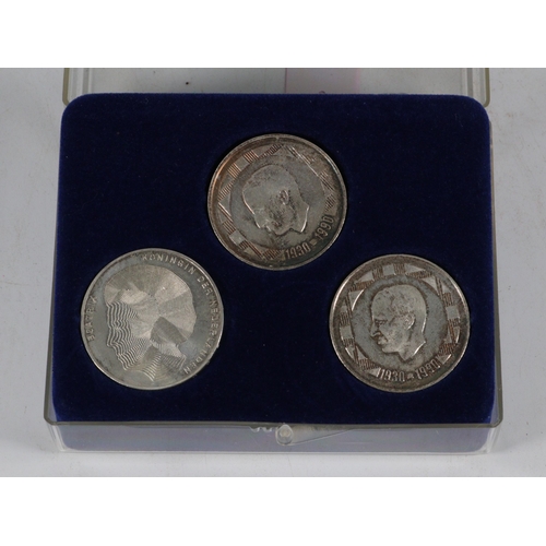 41 - A three silver coin set commemorating the 1990 merger of AMEV and AG group