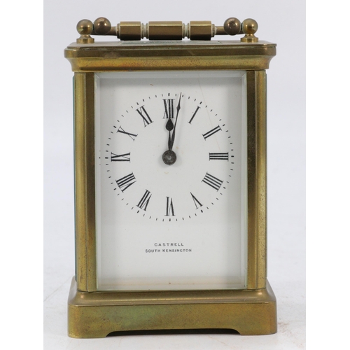 67 - A Castrell South Kensington brass cased carriage clock with visible escapement, appears over wound, ... 