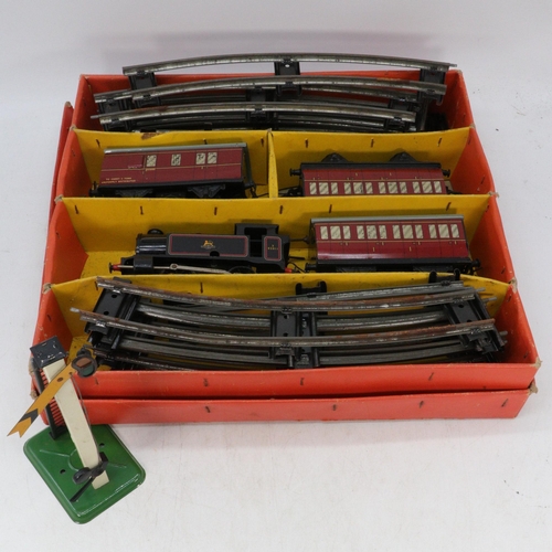 77 - Hornby 0 gauge clockwork train set with original box together with a boxed signal arm.