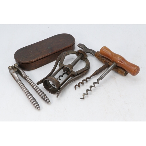 116 - A James Healey and sons double leaver corkscrew together with two wooden handled corkscrews, nut cra... 