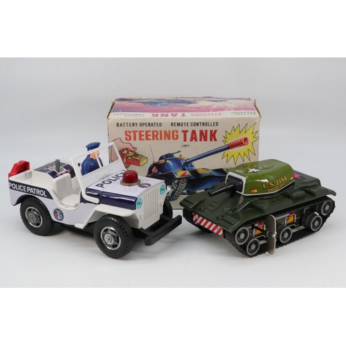 127 - Marx toys steering tank, together with tinplate clockwork tank and a TN Japan Police Jeep