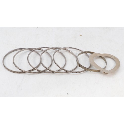 206 - Five Hong Kong sterling silver bangles together with a silver expanding bracelet and a hallmarked si... 