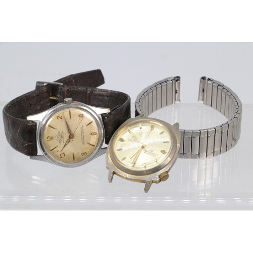 207 - A Buler 17 jewels wind-up wristwatch together with a lectro 121 unbreakable main spring, Swiss made ... 