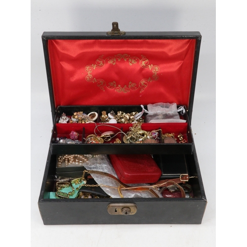 222 - Black hinged jewellery box containing assorted fashion watches, two silver lockets, gilt metal denta... 