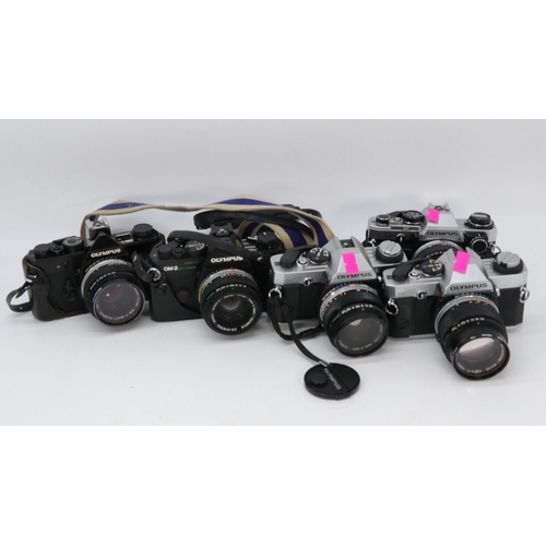 344 - Olympus OM-1N camera fitted zuiko 50mm lens, together with an OM-2 with zuiko 50mm len, 2 x OM20 bot... 