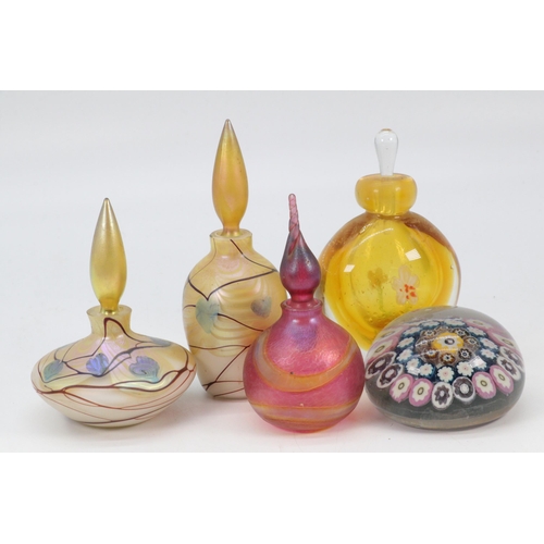 63 - Two Okra scent bottles, two further glass scent bottles and a paperweight. (tallest approx. 14.5cm t... 