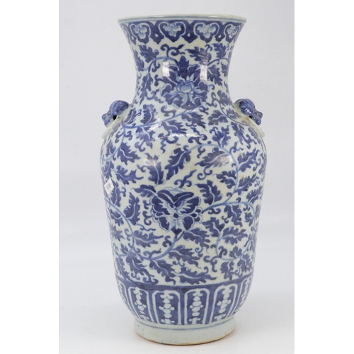 79 - Chinese vase decorated blue foliage (approx. height 37cm)