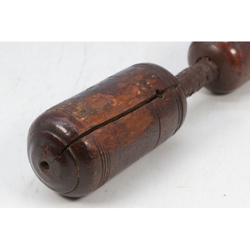 550 - Antique turned wooden cosh noted split to top together with Large cotton reel with another similar, ... 