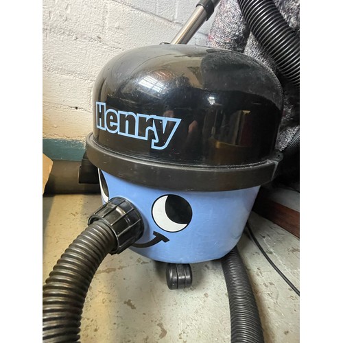 466 - A blue Henry Hoover (appears in working order not tested for functionality TRADE SPARES OR REPAIRS)