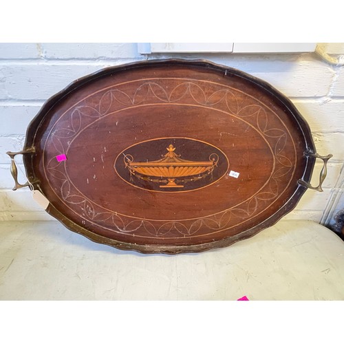 471 - An Oak tambour fronted pipe rack together with an Edwardian oval tray with brass handles