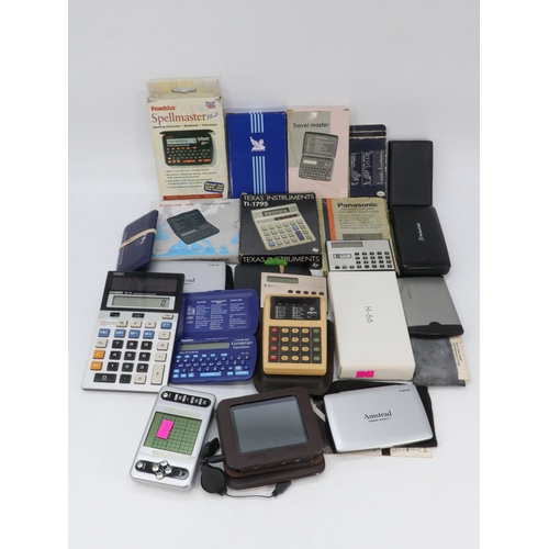 246 - Panasonic JE-408U calculator in wallet and box, together with other calculators, spell masters, trav... 