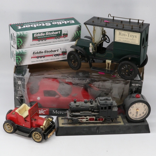 358 - A Mercedes Benz remote control car, two boxed Eddie Stobart Lorries, Tin Plate model of a vintage va... 