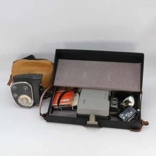 380 - Polariod 220 field camera in original case, together with a Quartz M cine camera, two other cine cam... 