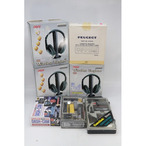 489 - VHS rewinders, headphones, Cassette players, 8mm rewinder and vintage Peugeot car stereo etc