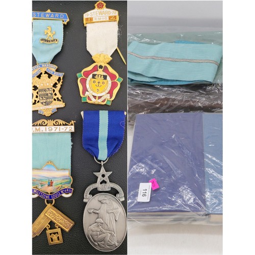 122 - Masonic interest  suitcase, medals, aprons, jewels and assorted books