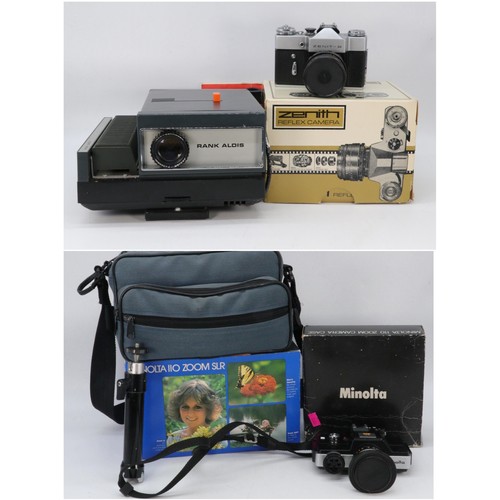 291 - A Minolta X300 with 50mm lens, Sigma mini wide, flash and selection of cokin filters, together with ... 