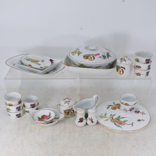 25 - A large selection of Royal Worcester Evesham to include Tureens, Flan dish, plates, side plates etc ... 