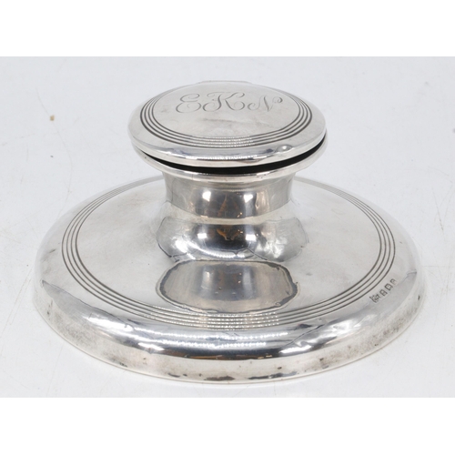 12 - Silver hallmarked inkwell with monogrammed initials to top weighted. (approx. 610g, 15cm diameter)