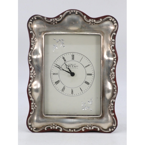 30 - An R. Carr silver fronted clock