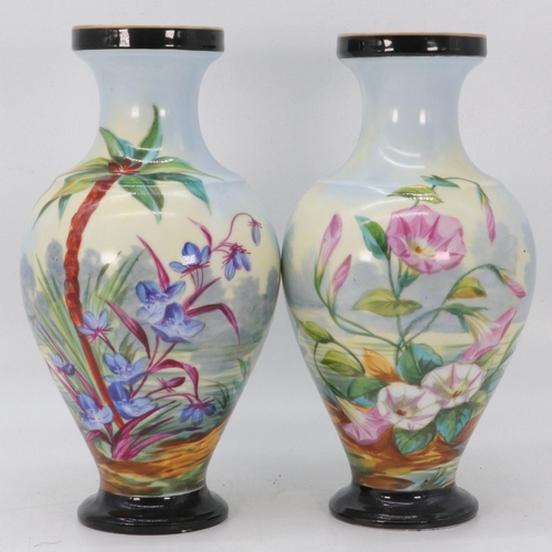 50 - A pair of porcelain vases hand painted with storks