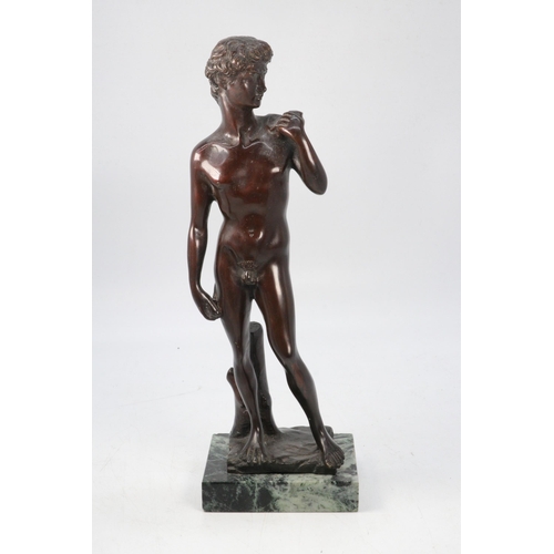 69 - Bronze statue of David on marble plinth. approx. 29cms tall.